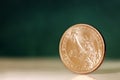 American One Dollar Coin over Green Background Royalty Free Stock Photo