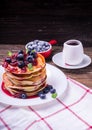 American pancakes with jam and blueberries