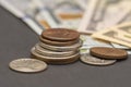 American paper dollars and metal cents close-up, selective focus. Concept: banking operations, cash settlement, currency exchange