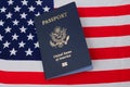 American passport of a US citizen against the background of the American flag Royalty Free Stock Photo