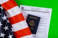 American passport on US Citizen Ship application an American flag Royalty Free Stock Photo