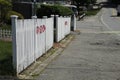 American patriotism .. american flag on white picket fence Royalty Free Stock Photo