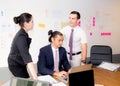 American people business team having using laptop during a meeting. Royalty Free Stock Photo