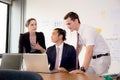 American people business team having using laptop during a meeting. Royalty Free Stock Photo