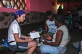 American pharmacist treats patient in medical clinic in rural Haiti.