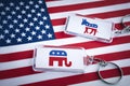 In American politics US parties are represented by either the democrat donkey or republican elephant. keychains with symbol of US Royalty Free Stock Photo