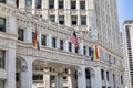 American and Pride flags on a building in Chicago Royalty Free Stock Photo