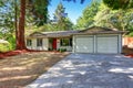 American rambler exterior with double doors garage. Royalty Free Stock Photo