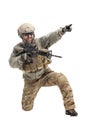 American ranger in military equipment and with a rifle aiming and shoots on a white background, portrait of a special forces