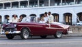 American red married classic car in havana city Royalty Free Stock Photo