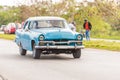 American retro car on the road, Vinales, Pinar del Rio, Cuba. Copy space for text.