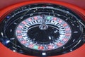 American roulette table, playing. Roulette wheel spinning clockwise rotation, tourelle