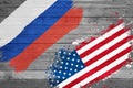 American and Russian flag on wooden ground land. Confliction and crisis concept .