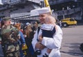 American Sailor Holding Baby After Returning Home From Sea