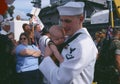 American Sailor Holding Baby After Returning Home From Sea, San Diego, California