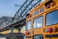 American School Bus in front of a German bridge Royalty Free Stock Photo