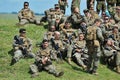 GALATI, ROMANIA - MAY 15, 2015: American and Serbian soldiers rest after a shooting session in the polygon, in Galati, Romania, m
