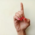 american sign language alphabet letter D displayed with isolated hand on light background Royalty Free Stock Photo