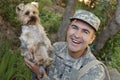 American soldier being welcomed by his dog