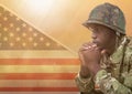 American Soldier thinking against american flag Royalty Free Stock Photo