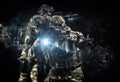 American soldiers in combat ammunition with weapons in the hands of equipped laser sights are in battle order