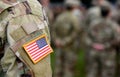 American Soldiers and Flag of USA on soldiers arm. US Army. Veteran Day Royalty Free Stock Photo