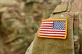 American Soldiers and Flag of USA on soldiers arm. US Army. Veteran Day Royalty Free Stock Photo