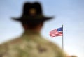 American Soldiers and US Flag. US troops Royalty Free Stock Photo