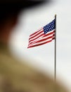 American Soldiers and US Flag. US troops Royalty Free Stock Photo