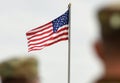 American Soldiers and US Flag. US troops Royalty Free Stock Photo