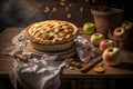 American style apple pie. A freshly baked cake stands on an old wooden table. Mood lighting. Tart with apples or fruit. Royalty Free Stock Photo