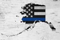 American thin blue line flag on map of Alaska Royalty Free Stock Photo