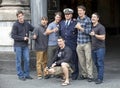 American tourists taking picture with an Italian cop. Catania, Sicily.