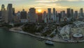 American urban landscape at sunset. Skyviews Miami Observation Wheel at Bayside Marketplace with reflections in