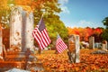 American veteran flags in autumn cemetery Royalty Free Stock Photo