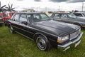 American vintage black 4 door sedan Chevrolet Caprice car manufactured in 1976 is presented at the festival