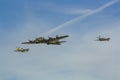 The American World War II bomber `Sally B` Boeing B-17G and escort fighters Royalty Free Stock Photo