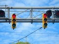 American yellow traffic train rail lights on blue sky