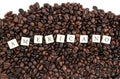 AMERICANO white cube text AND coffee beans background