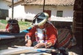 Amerindian woman and Andean textile