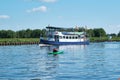 Amersfoort, Hoogland, the Netherlands June 13, 2021, Bicycle boat, ferry eemland on the river Eem with canoeist and a Royalty Free Stock Photo