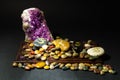 Amethyst crystal and painted stones with Om symbol Royalty Free Stock Photo