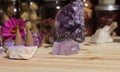 Amethyst Crystals With Flowers and Incense Cones on Meditation Table Royalty Free Stock Photo