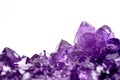 Amethyst crystals geode isolated on white. Royalty Free Stock Photo