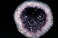 Amethyst Geode Stone against Black Background