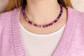 Necklace with lavender amethyst. Handmade jewelry. Selective focus