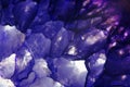 Amethyst macroshot blue background closeup