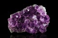 Amethyst mineral stone, black background Royalty Free Stock Photo