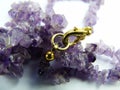 Amethyst necklace on white background Royalty Free Stock Photo