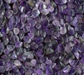 Gemstones amethyst bright purple, texture of stone. Beautiful background of amethyst stones